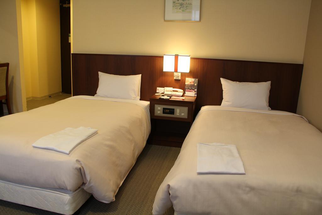 Hotel Sunroute New Sapporo Habitación foto