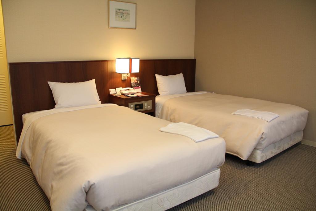 Hotel Sunroute New Sapporo Habitación foto