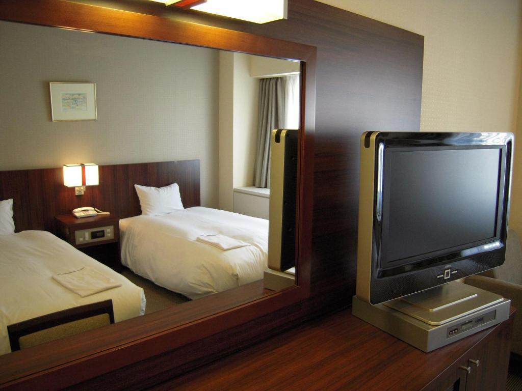 Hotel Sunroute New Sapporo Habitación foto